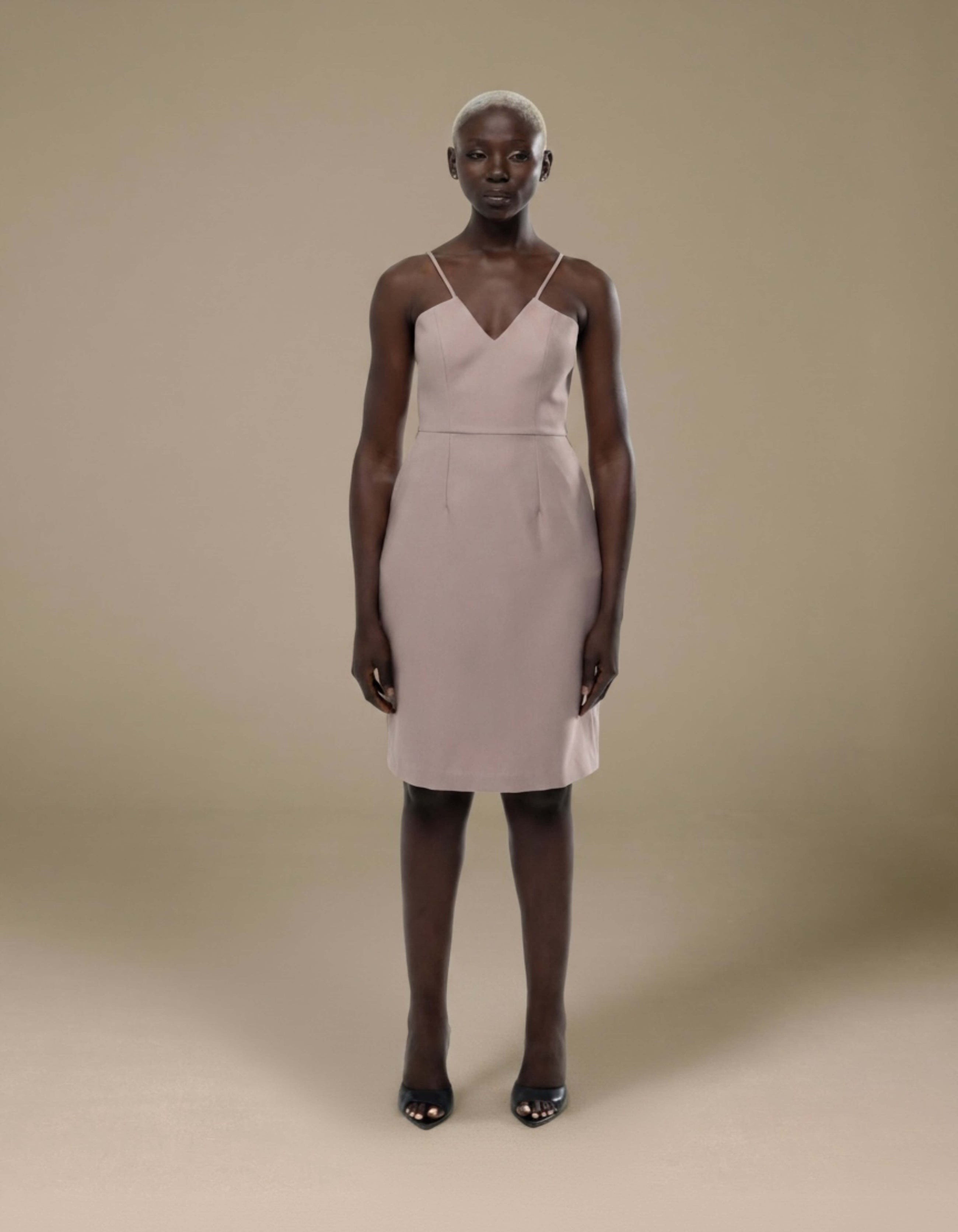 Blush minimalist slip dress with V-neckline and slim straps