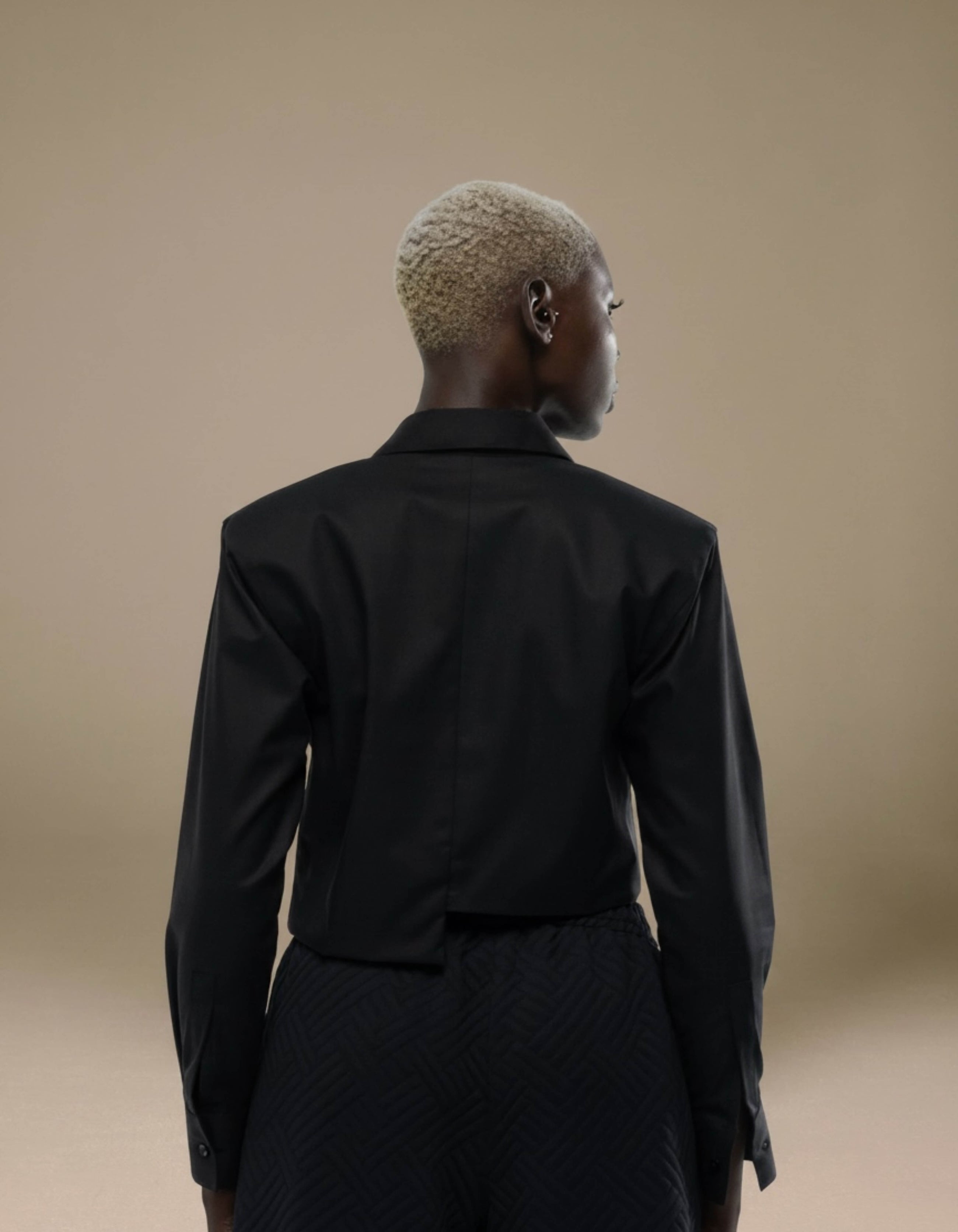 Black cropped tailored jacket back view luxury womenswear