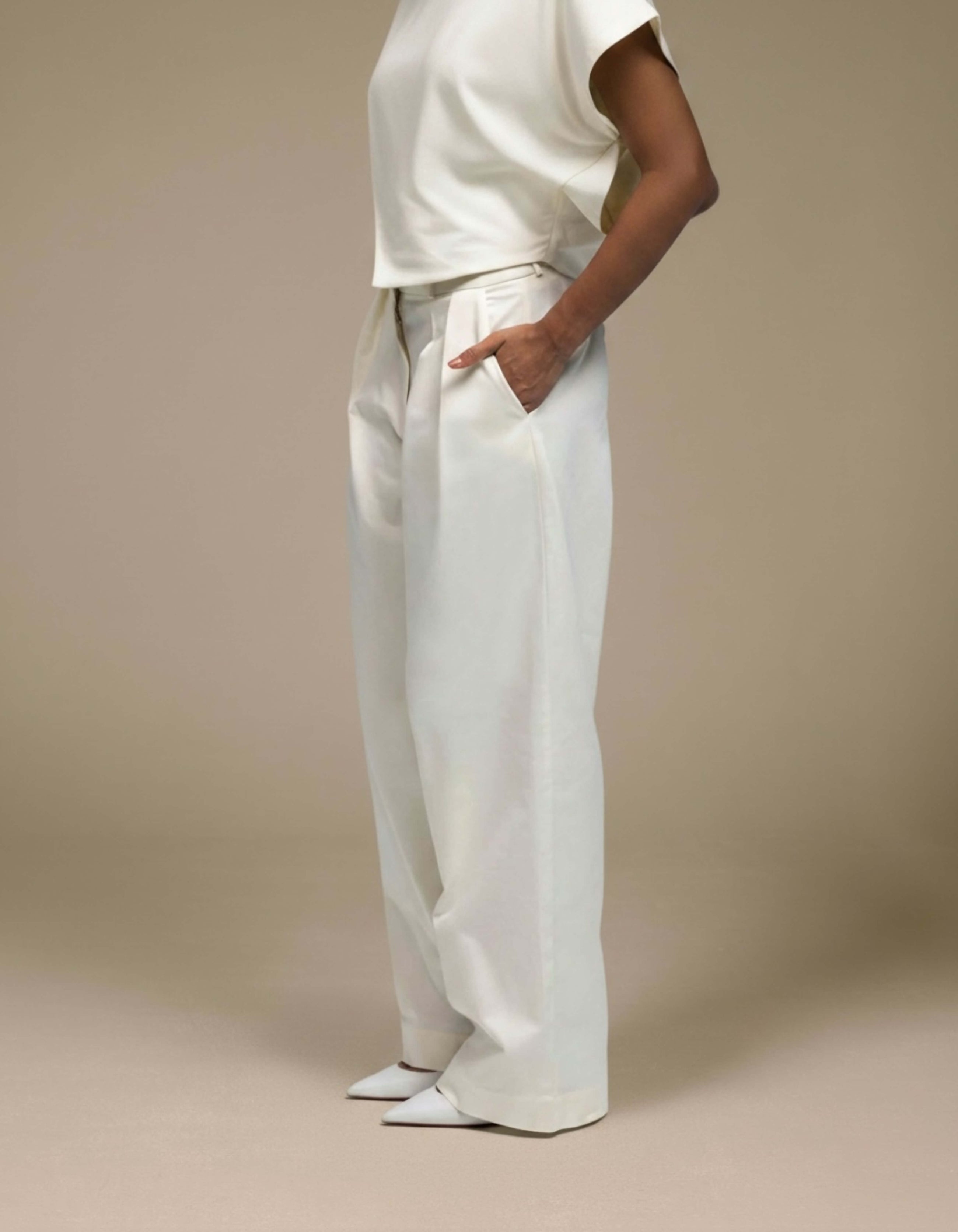 Ivory wide-leg tailored trousers with front pleats, luxury womenswear