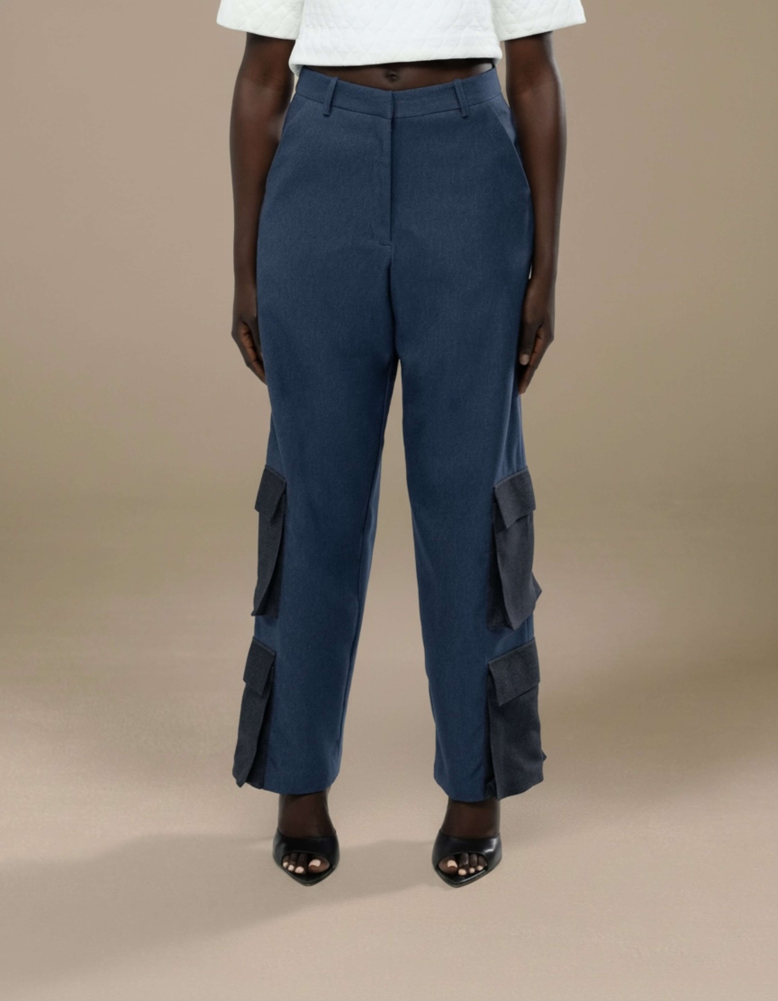 Navy tailored cargo trousers with contrast pocket detailing, luxury womenswear
