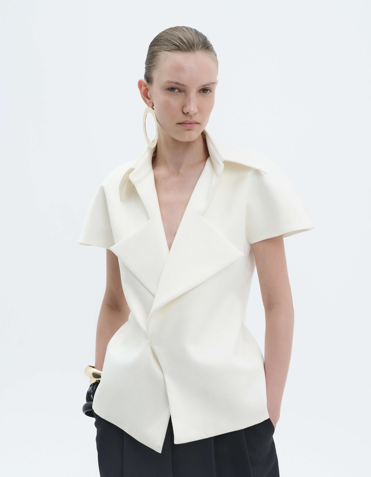EXAGGERATED LAPEL TOP
