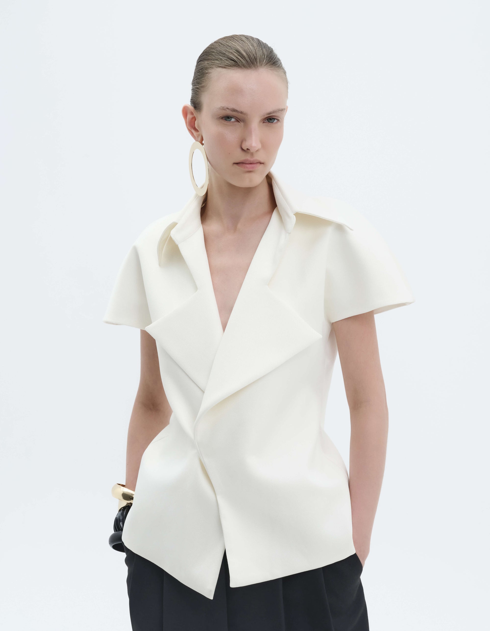 EXAGGERATED LAPEL TOP