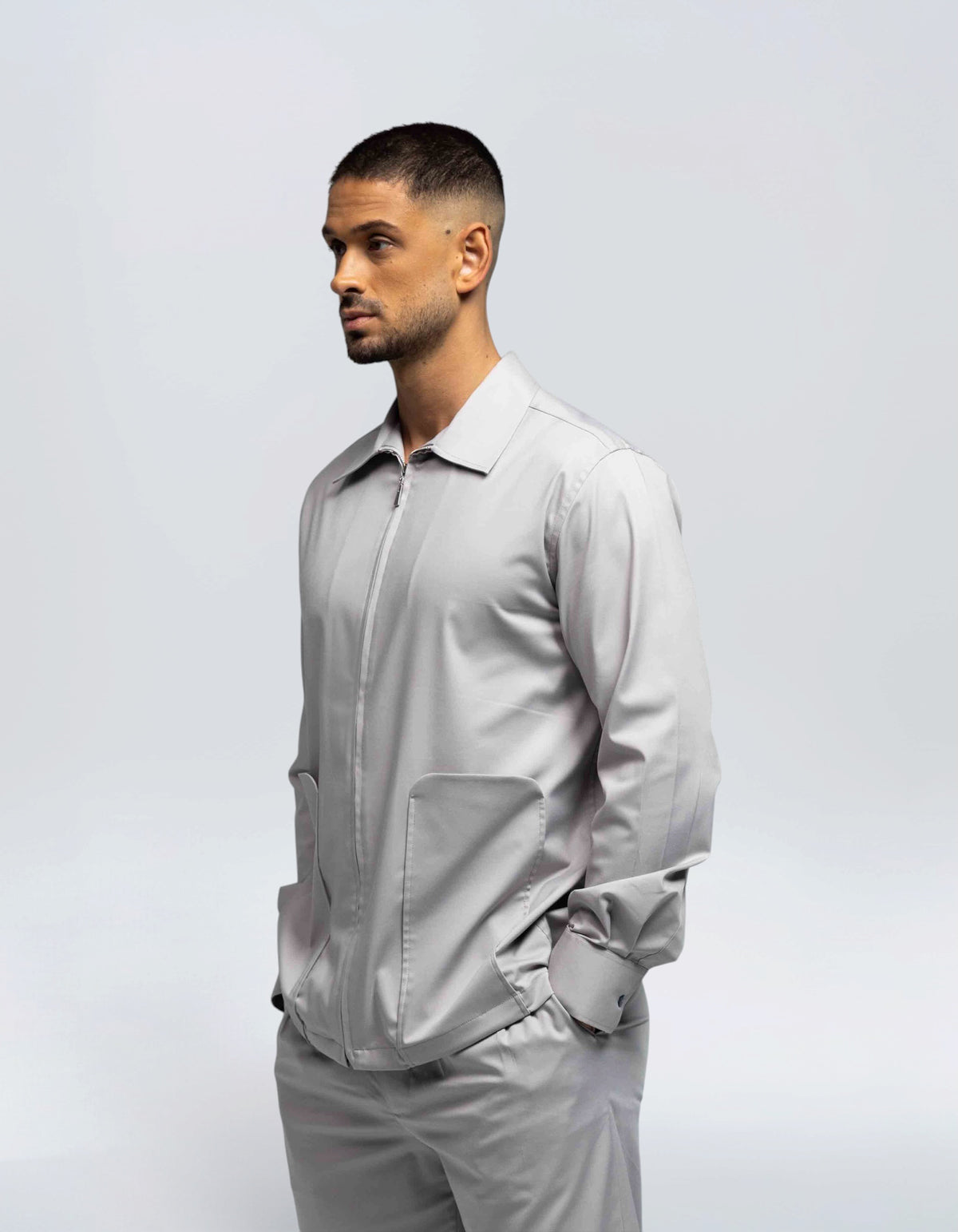 CAMICIA CON ZIP E TASCA LUNGA