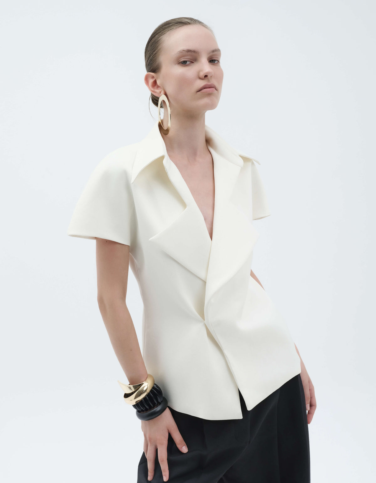 EXAGGERATED LAPEL TOP