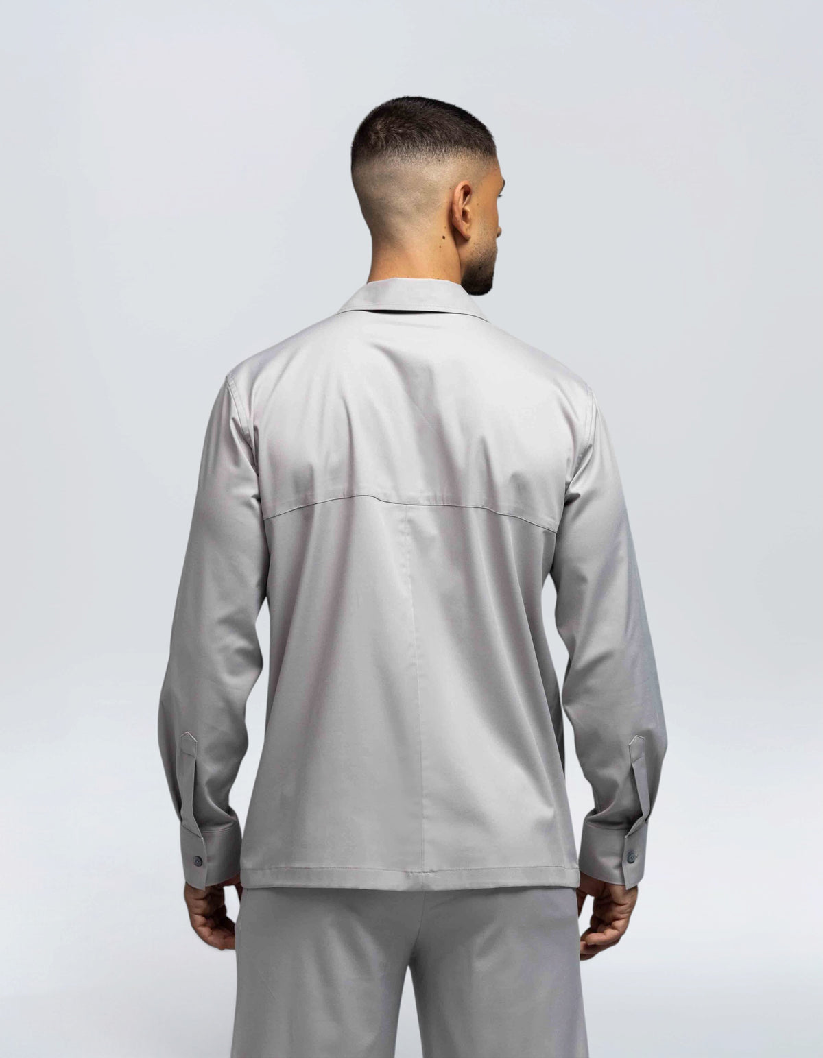 CAMICIA CON ZIP E TASCA LUNGA