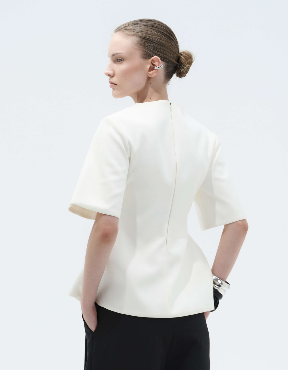 STRUCTURED HOURGLASS TOP WITH EXAGGERATED SLEEVE