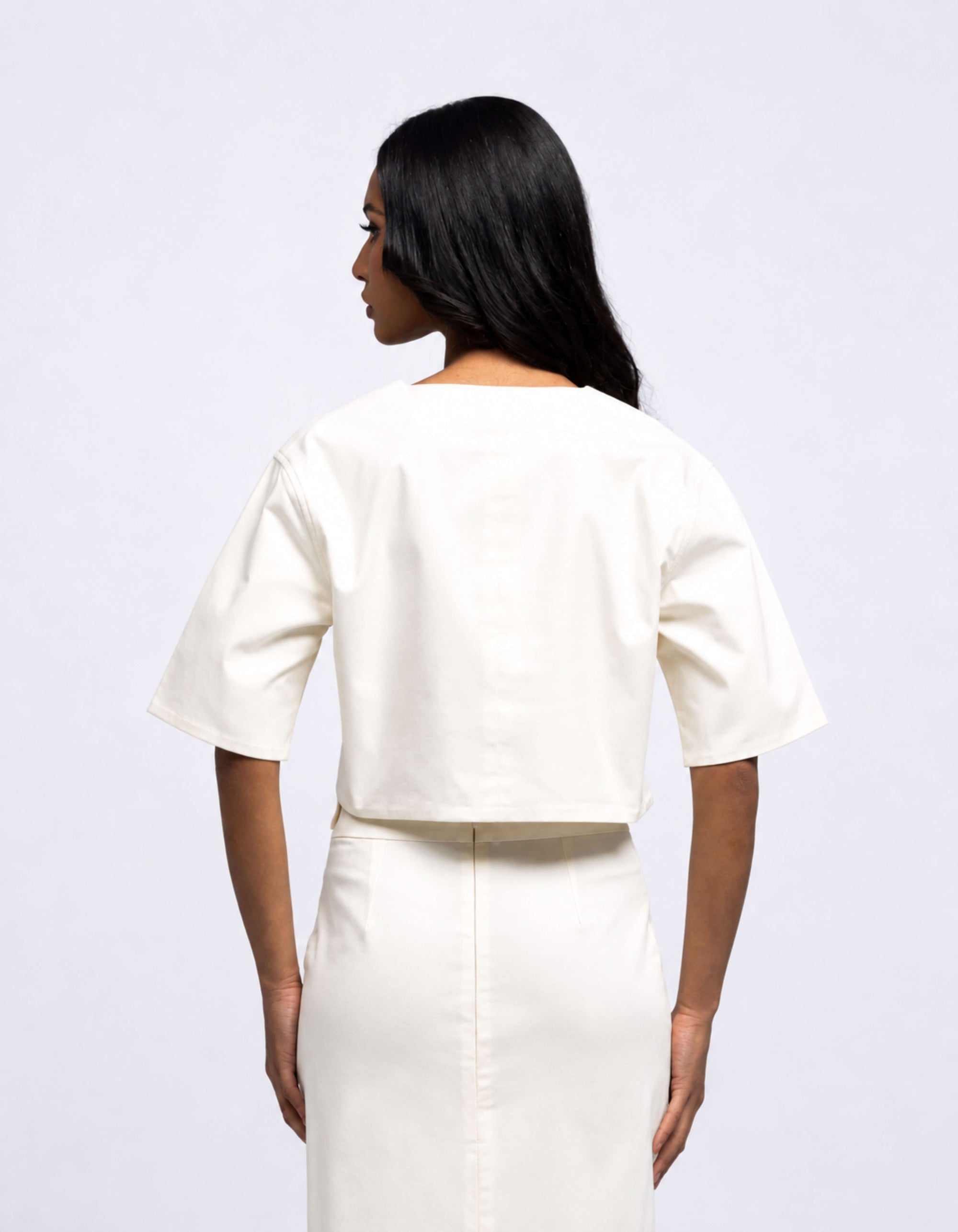 TOP CORTO CON TASCA OVERSIZE 