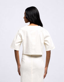 TOP CORTO CON TASCA OVERSIZE 