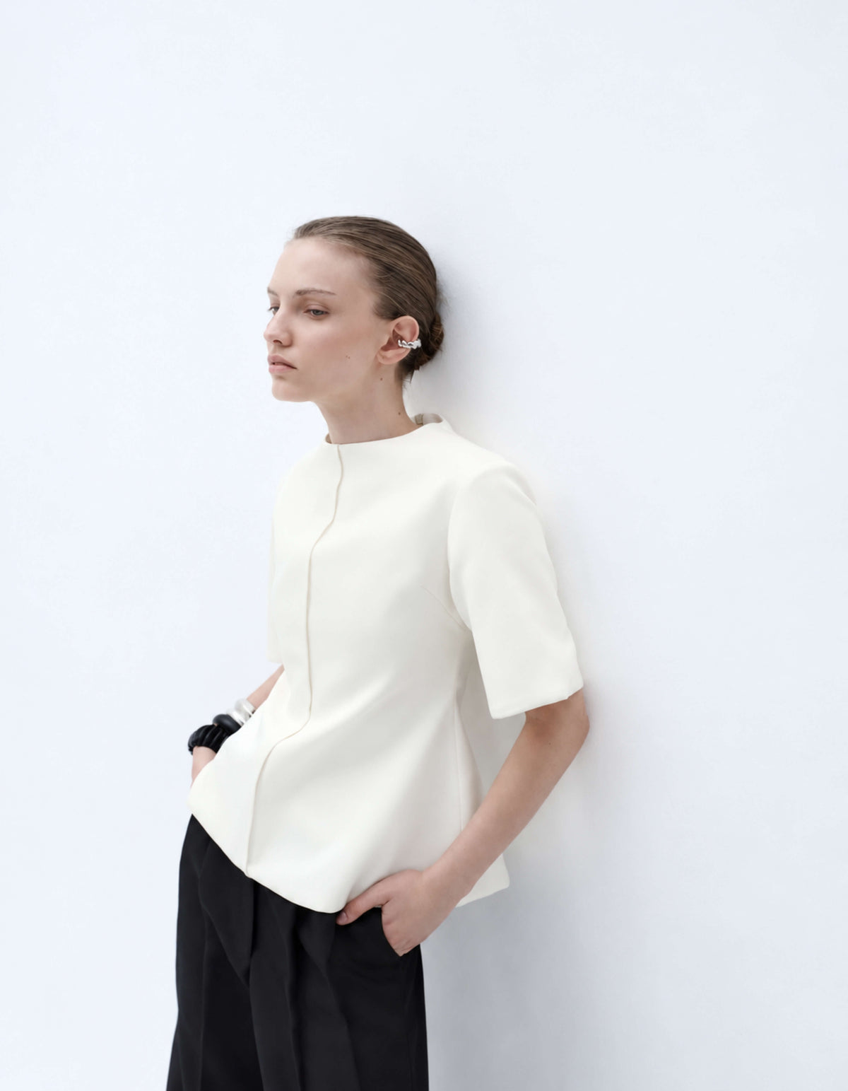 STRUCTURED HOURGLASS TOP WITH EXAGGERATED SLEEVE