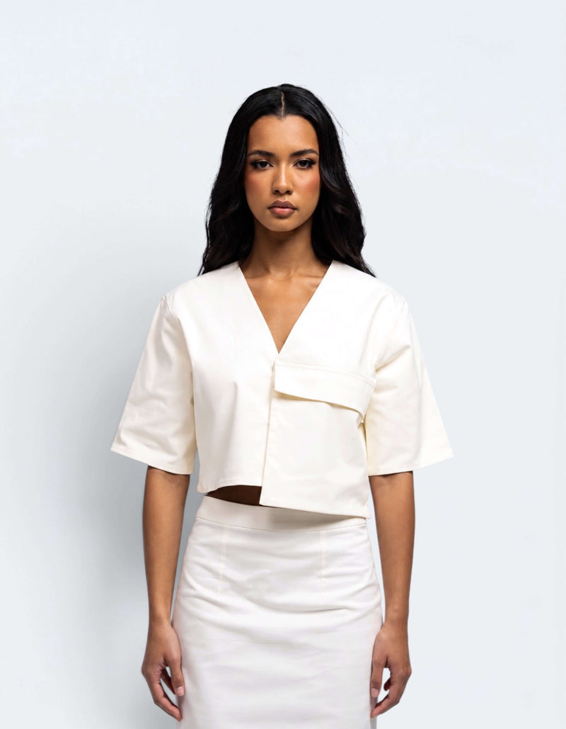TOP CORTO CON TASCA OVERSIZE 