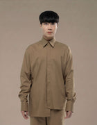 CHEMISE À MANCHES LONGUES ASYMÉTRIQUE