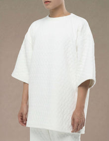 Oversized white quilted minimalist top with drop shoulders
