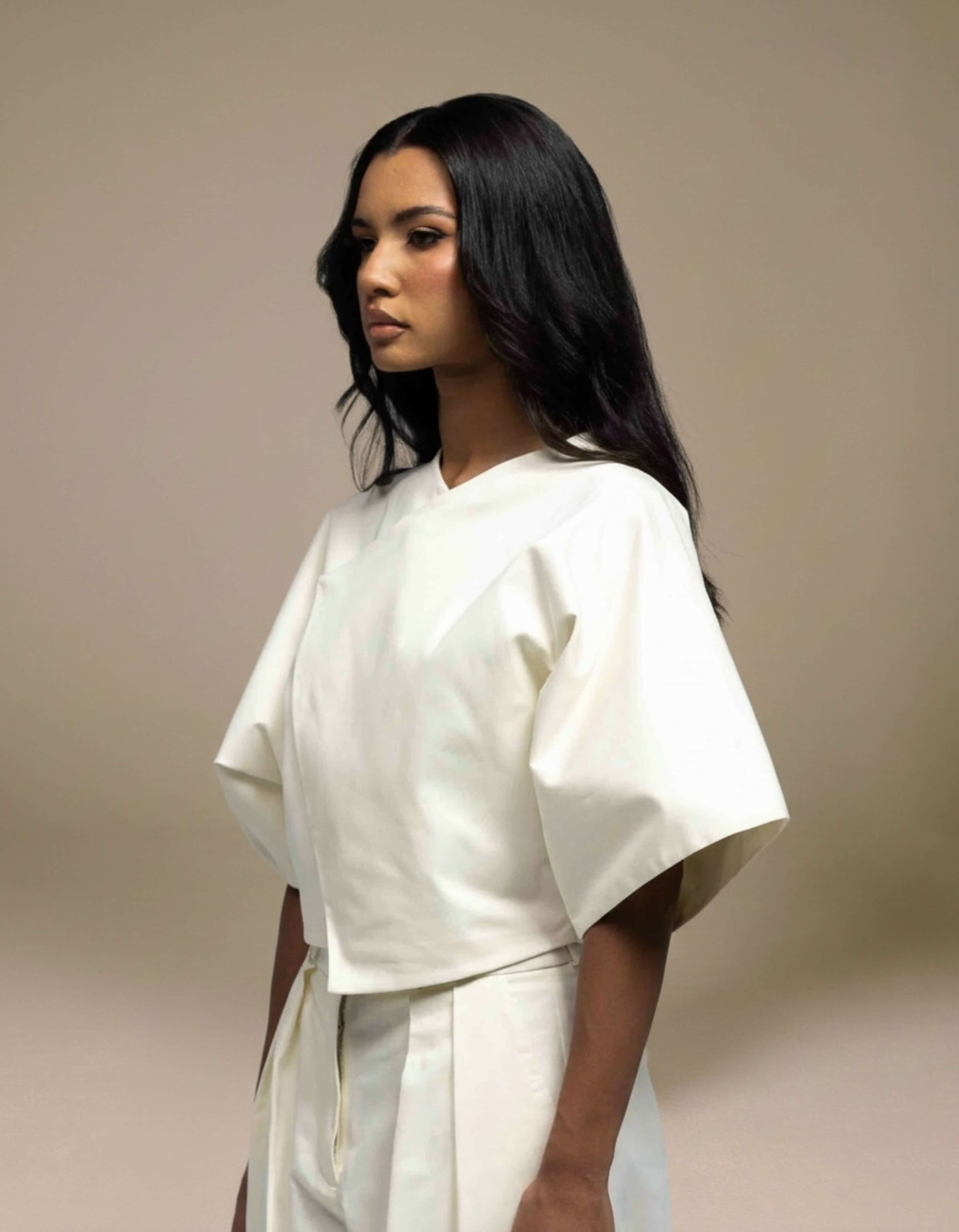 Ivory structured boxy top with wide sleeves minimalist luxury womenswear
