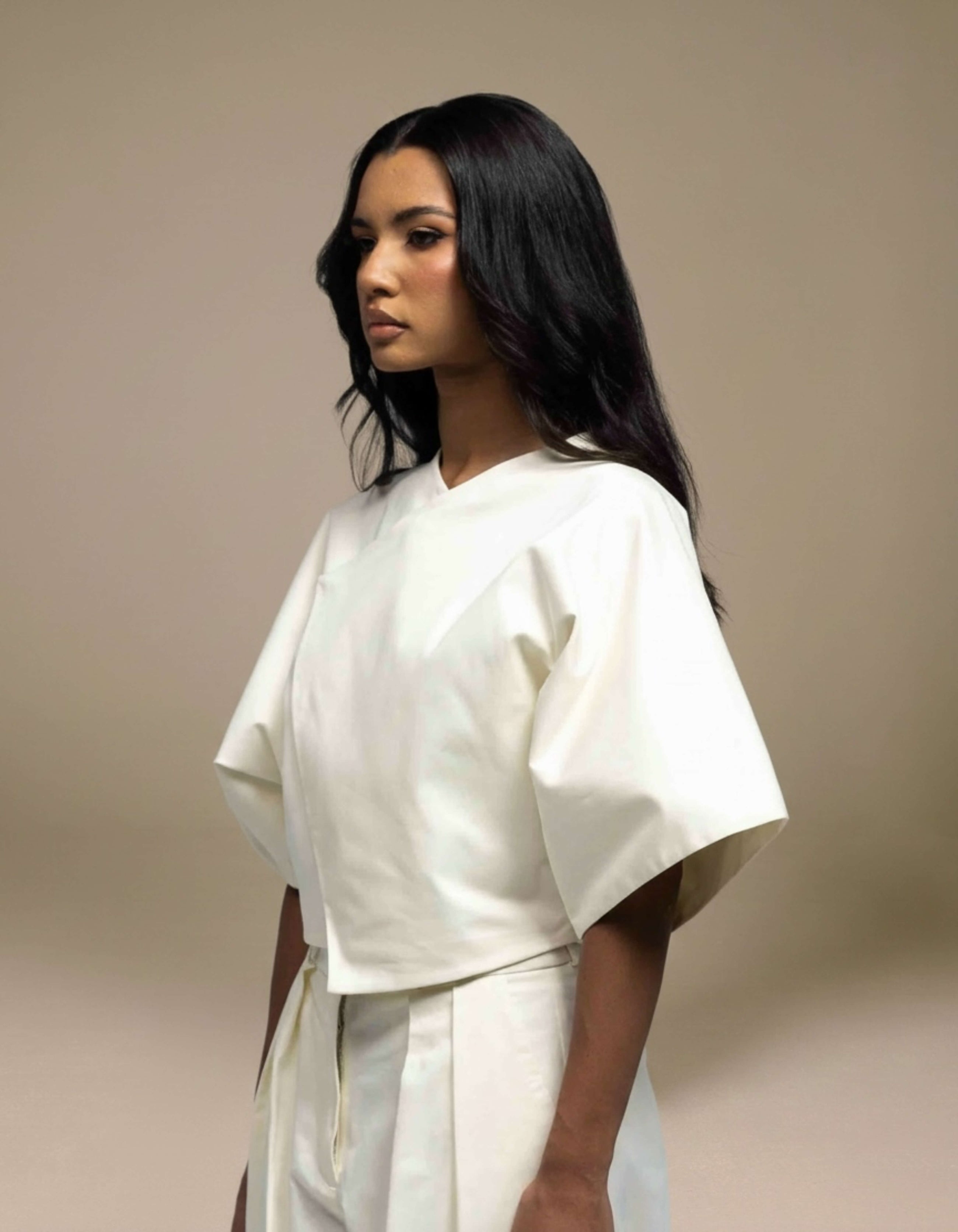 Ivory structured boxy top with wide sleeves minimalist luxury womenswear
