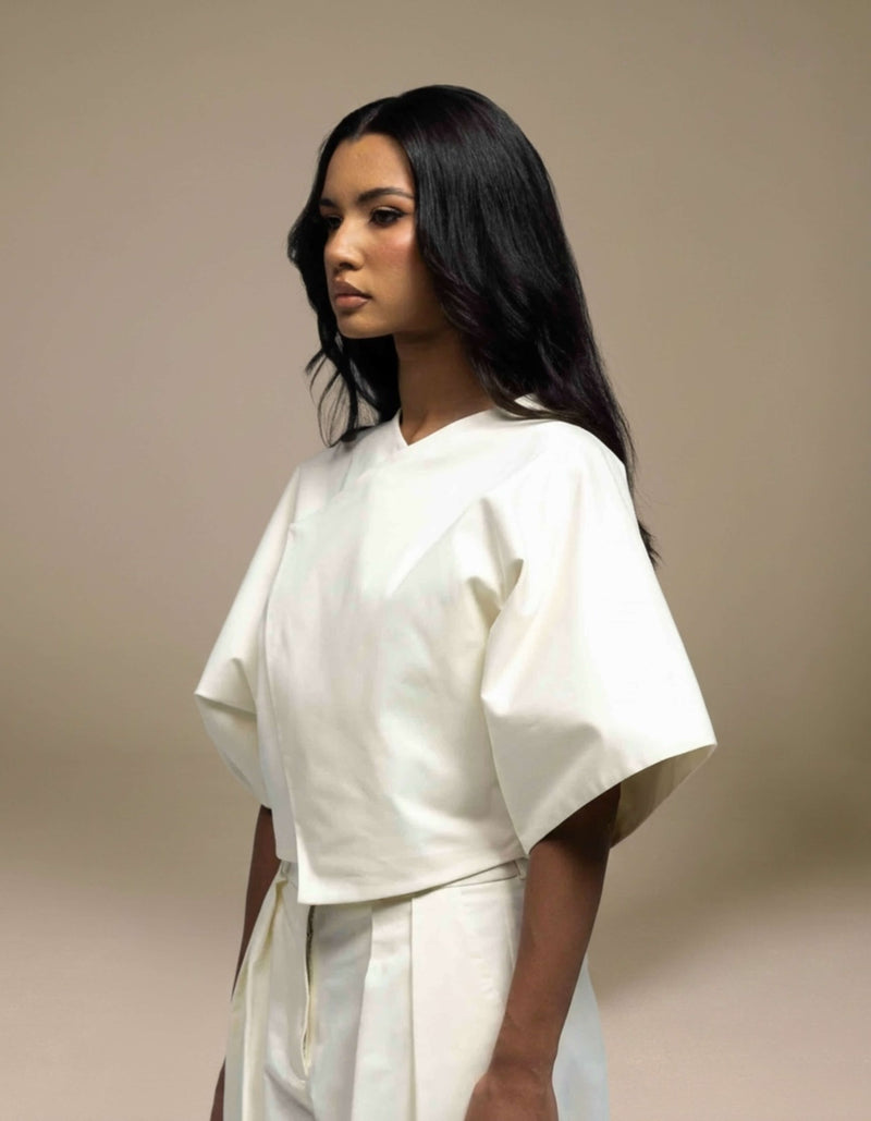 Ivory structured boxy top with wide sleeves minimalist luxury womenswear
