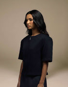 Navy textured jacquard cropped top with zip detail, luxury womenswear

