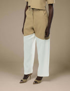 Tailored wide-leg trousers camel white colorblock minimalist luxury womenswear
