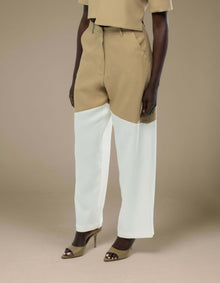 Tailored wide-leg trousers camel white colorblock minimalist luxury womenswear
