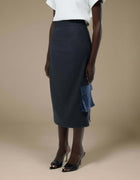 Navy tailored midi pencil skirt with draped bow pocket detail
