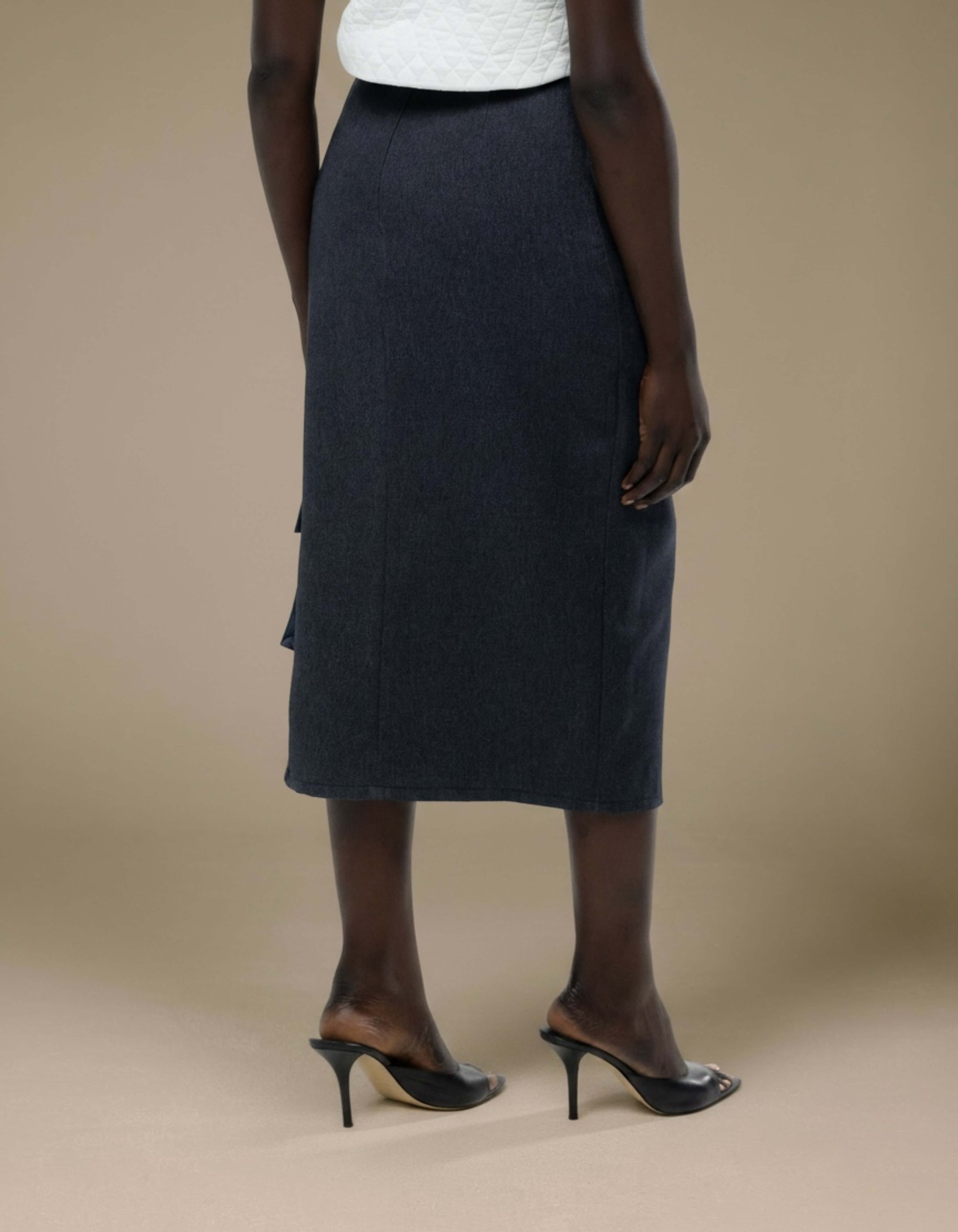 Charcoal tailored midi skirt with side pocket detail, heels
