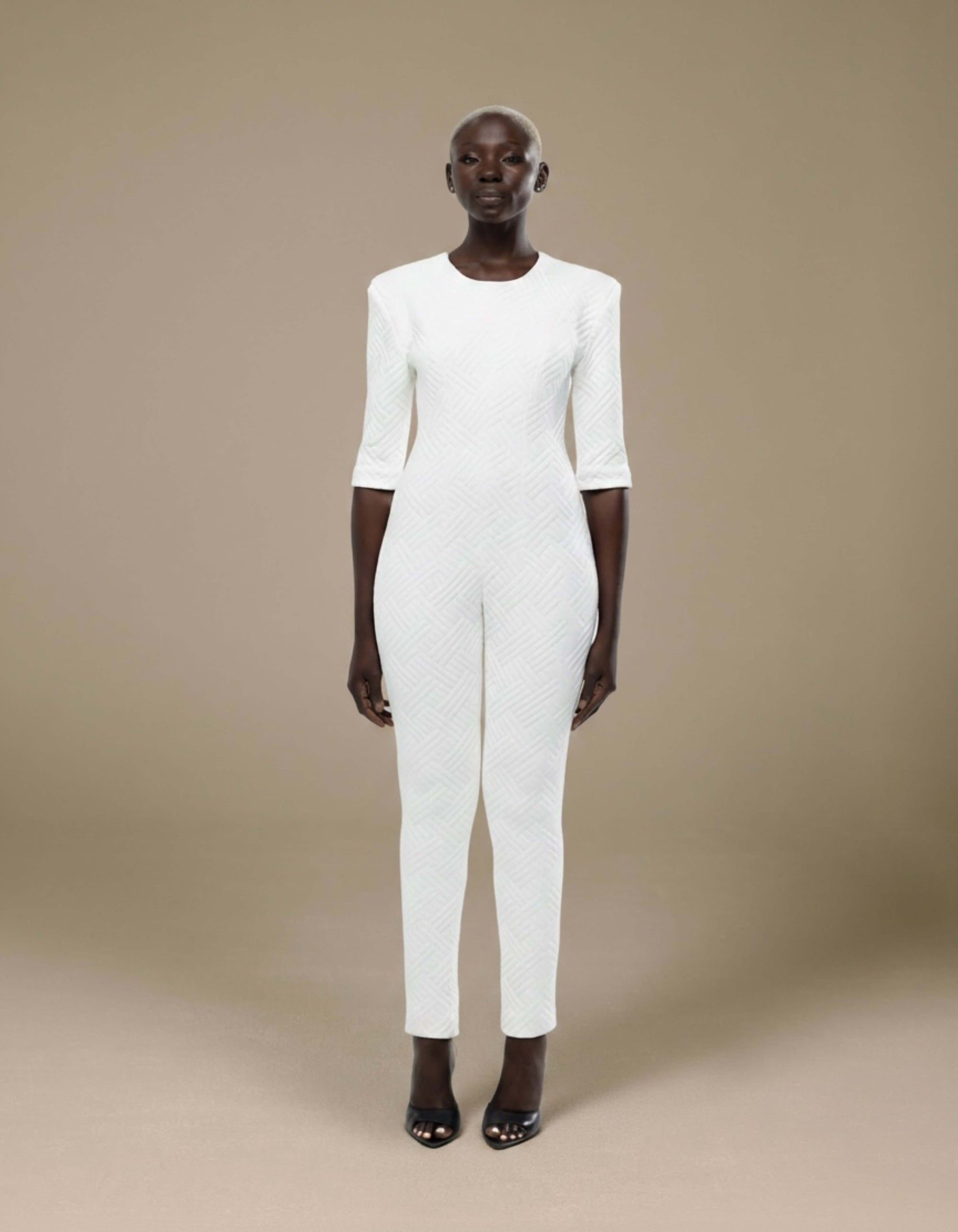 STRUCTURED SHOULDER PAD JUMPSUIT