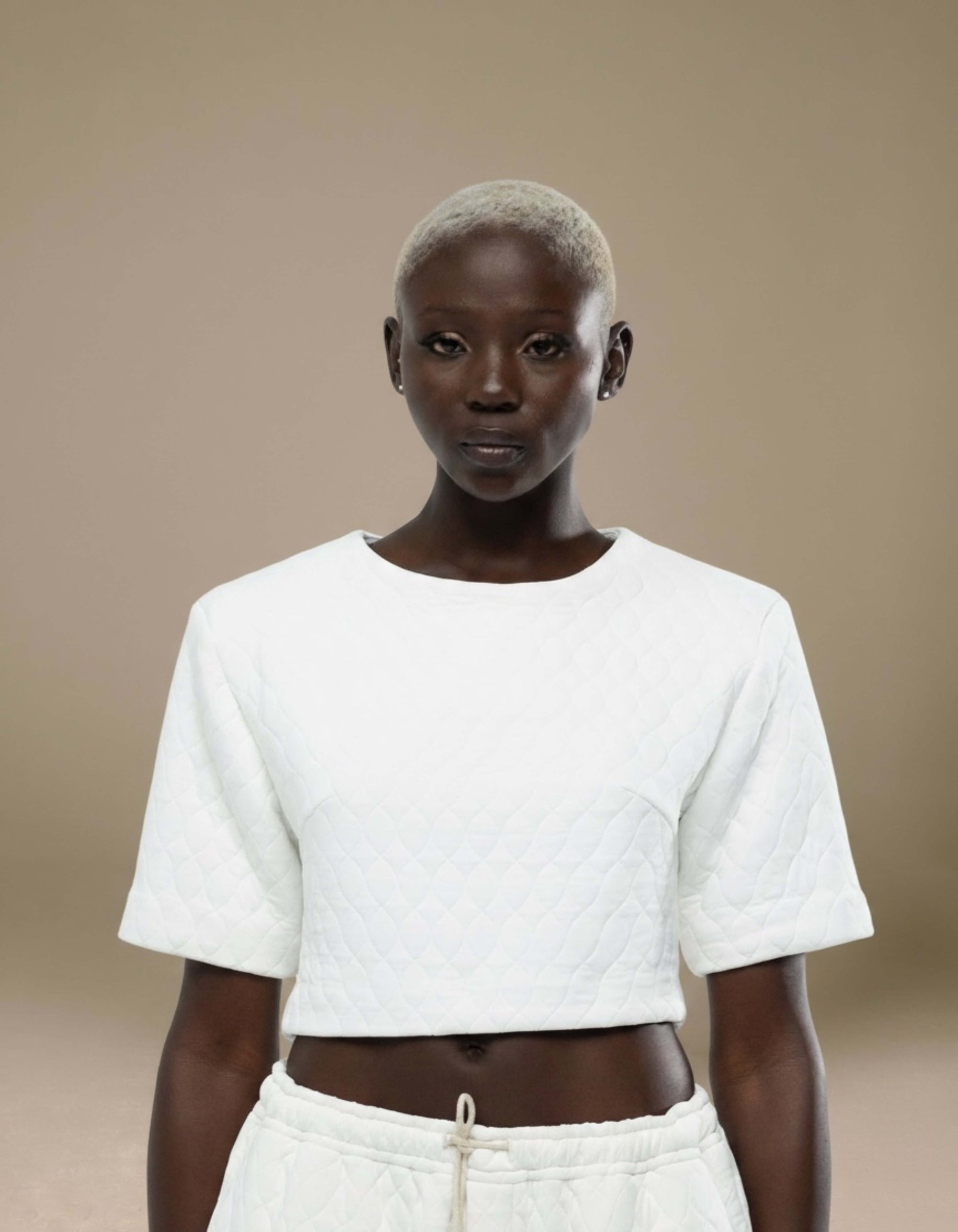 White quilted cropped short-sleeve top minimalist luxury co-ord
