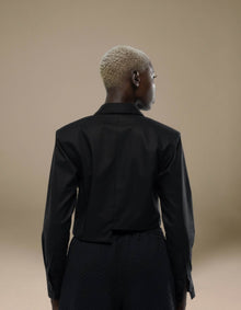 Black cropped tailored jacket back view luxury womenswear
