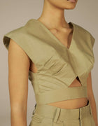 Sage structured crop top with V-neck cutout detail, minimalist luxury womenswear
