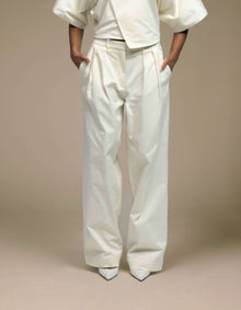 Ivory wide-leg pleated tailored trousers luxury womenswear
