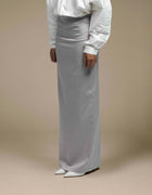 Minimalist silver-grey satin maxi skirt tailored column silhouette luxury womenswear

