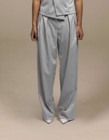 Silver grey wide-leg pleated tailored trousers luxury womenswear
