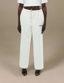 Ivory quilted wide-leg drawstring trousers with Elamins logo detail
