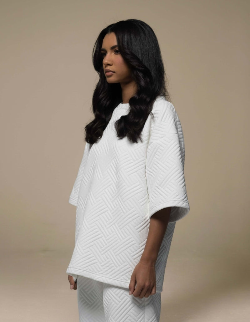 Ivory quilted oversized top with geometric texture, luxury womenswear co-ord set
