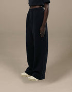 Black quilted wide-leg trousers with geometric texture, luxury womenswear
