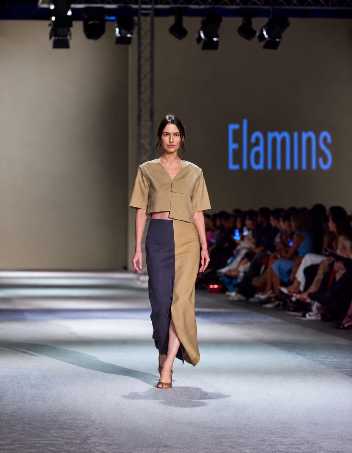 Elamins Vertical Two Tone Skirt In Tan And Denim Styled With The Elamins Oversize Pocket Crop Top On The Runway At TheEventDXB Fashion Show