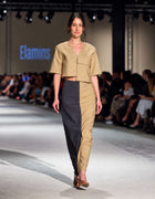 Front Runway View Of The Elamins Vertical Two Tone Maxi Skirt, Showing Its Contrasting Tan And Denim-Style Panels With The Elamins Oversize Pocket Crop Top At TheEventDXB